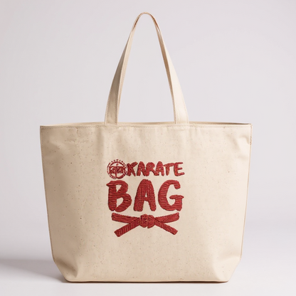 Beige tote bag with 'Karate Bag' text in red on a light gray background