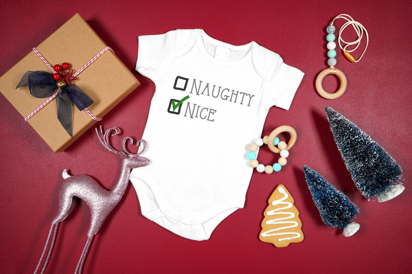 Naughty or Nice embroidered Christmas baby onesie